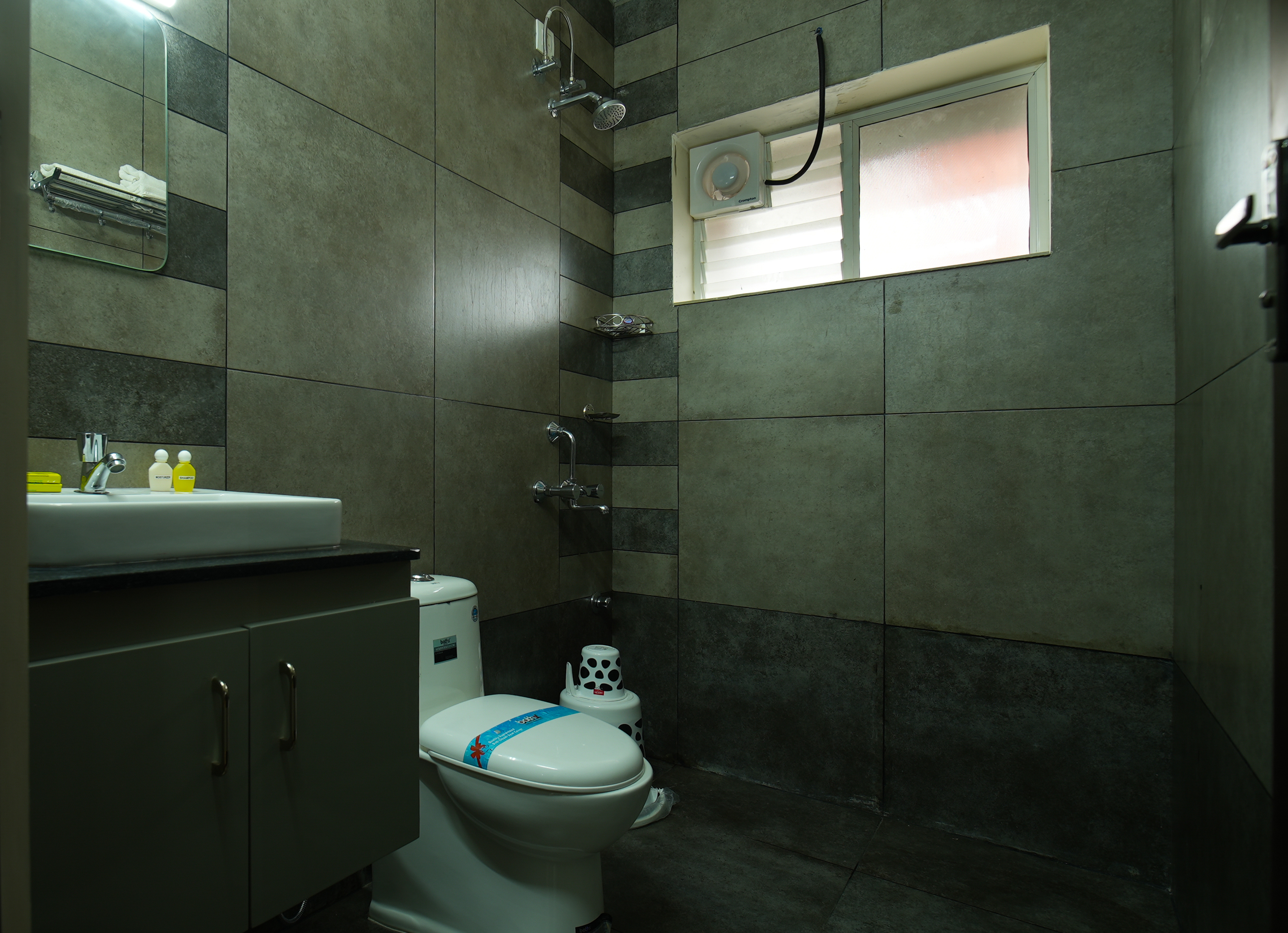 Family suite near Infopark Kochi with kitchen and living area
